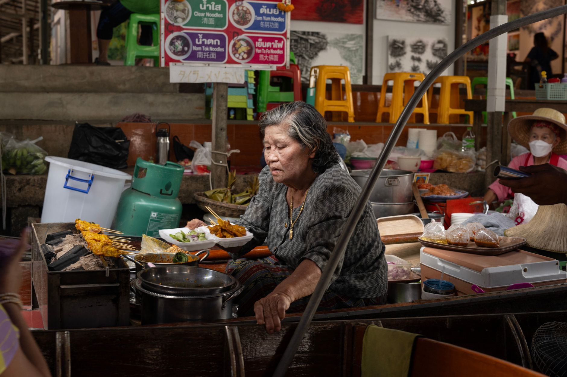 bangkok street food noodle stall evening