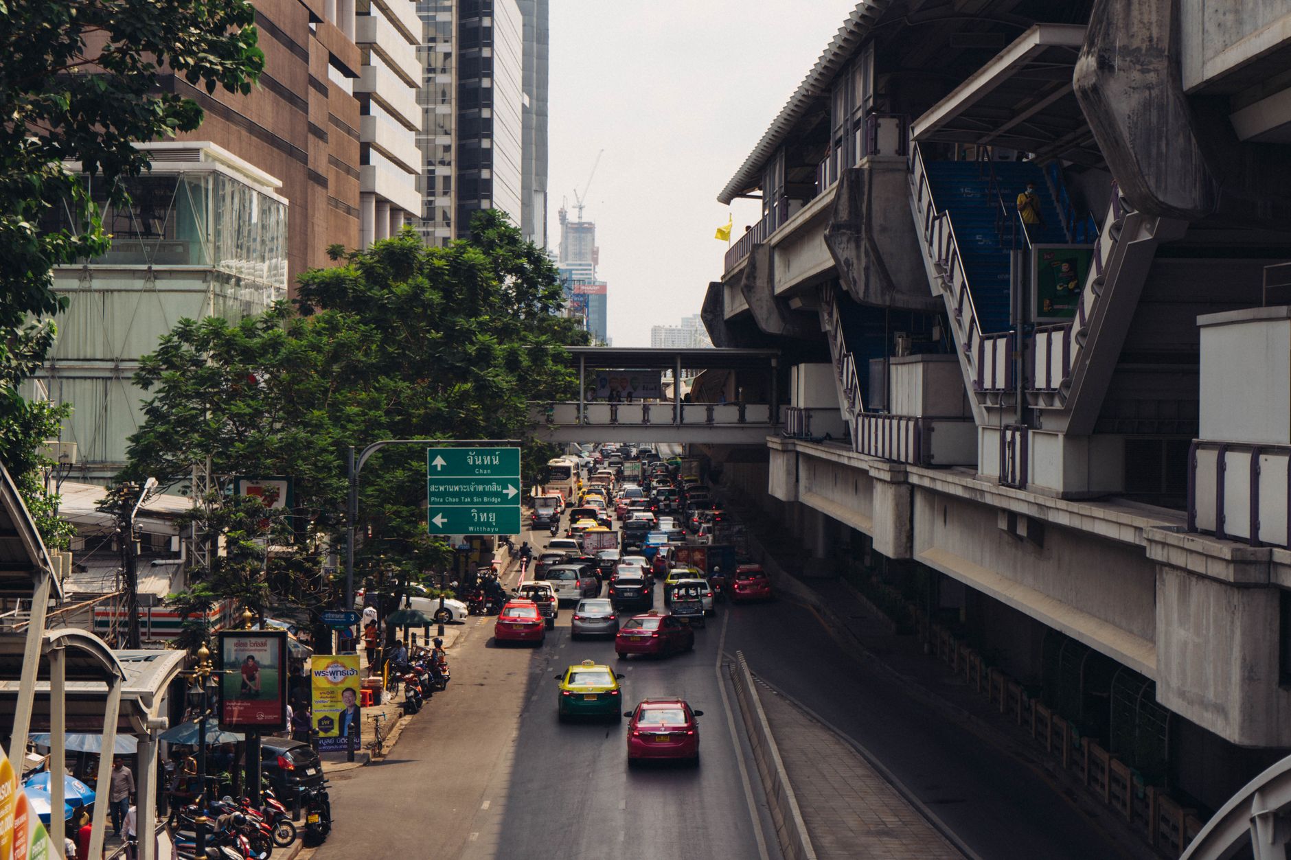 silom bangkok bts station street evening