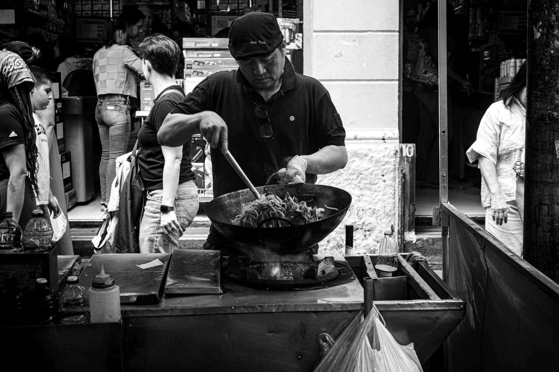 street food vendor cooking wok