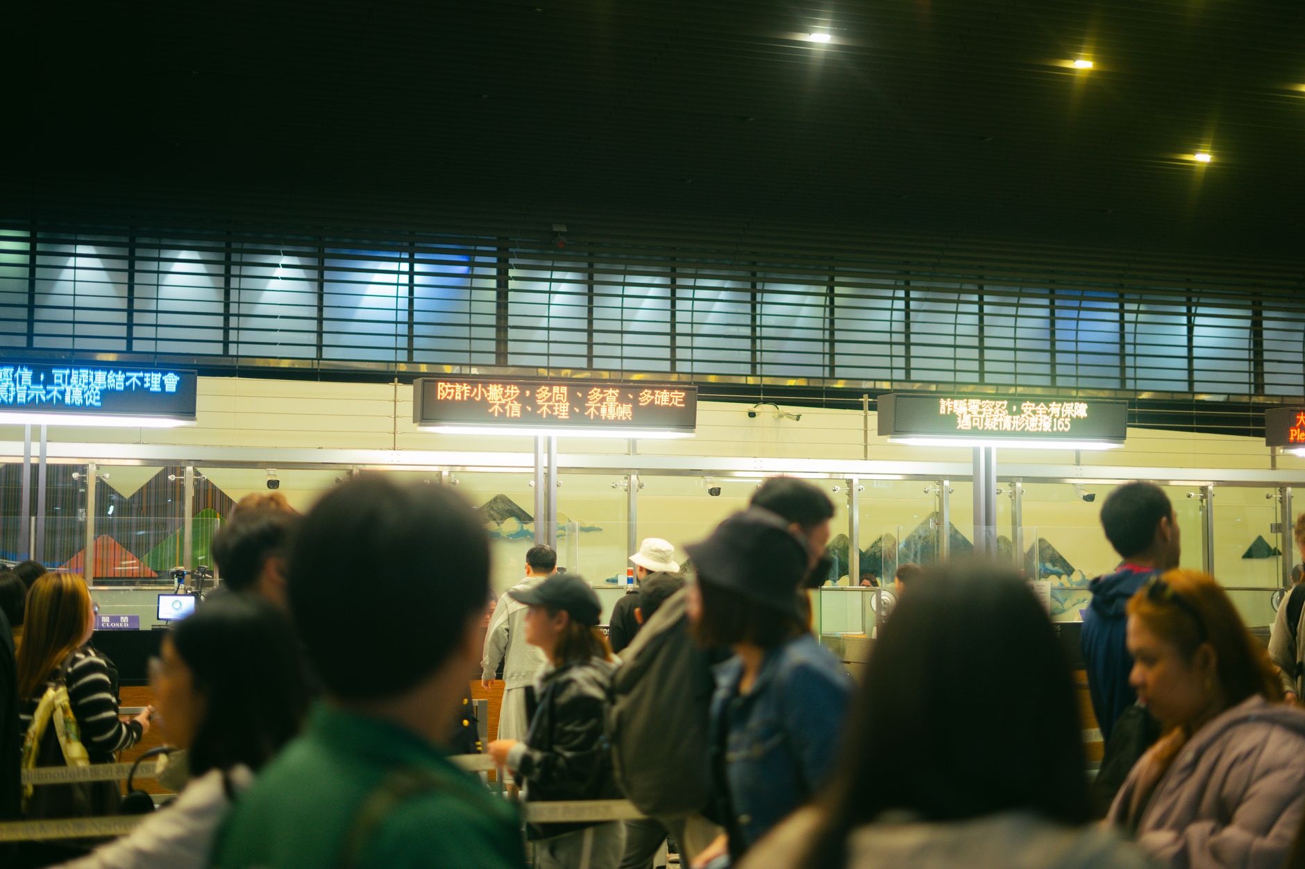 immigration queue travelers airport counter